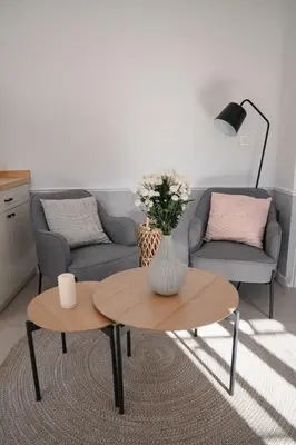 a living room with a table and a couch at Nest 382 in Kotor