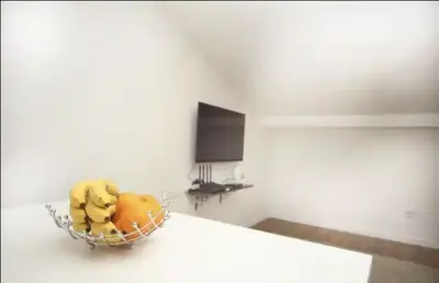a bowl of fruit on a table in a room at Casa Calda apartman in Budva
