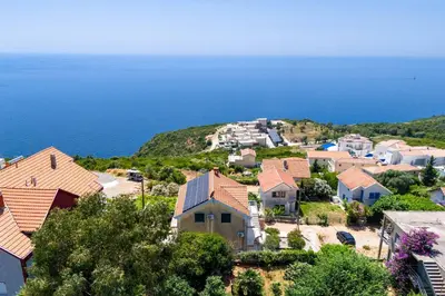 an aerial view of a village with the ocean at Vacation home in Budva near the beach in Krimovice