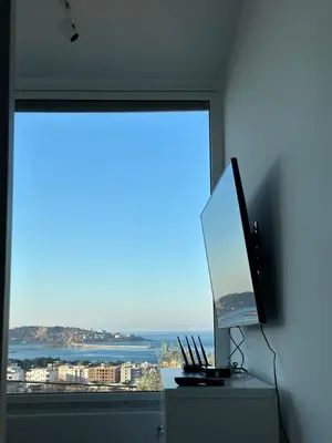 a large window with a view of the ocean at MiU Bar Apartment in Donji Susanj
