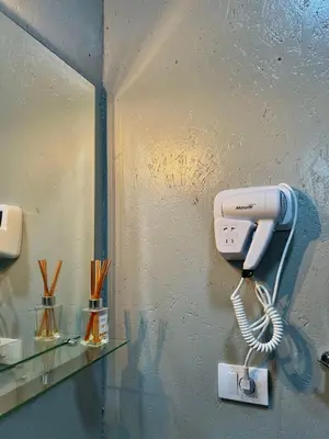 a phone is hanging on a wall at Barbana Cottage , Ada Bojana in Ulcinj