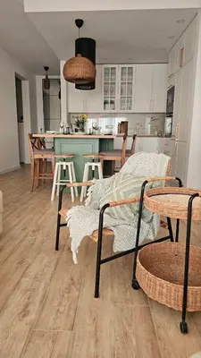 a kitchen and dining room with a table and chairs at Monte View Apartments in Ulcinj