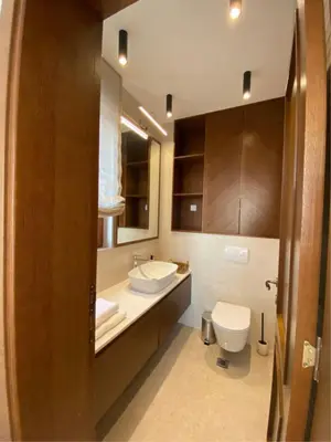 a bathroom with a sink and a toilet at Belsize Villas in Budva