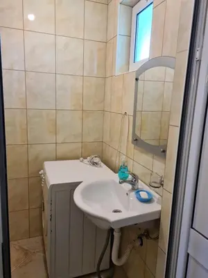 a bathroom with a sink and a mirror at Nomad apartments in Ulcinj