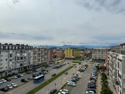 an aerial view of a city with a parking lot at Apartment 50 in Podgorica