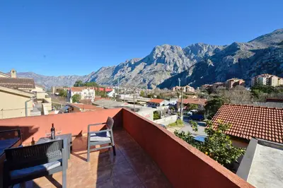 a balcony with a view of a mountain at the Right Choice Apartment in Kotor