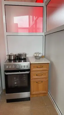 a kitchen with two pots on top of a stove at Sea in Ulcinj