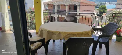 a table and chairs on a balcony with a view at Summer Paradise, Bar in Bar