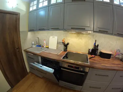 a kitchen with gray cabinets and a sink at KOTOR OLD TOWN 2 bedroom apartment in Kotor