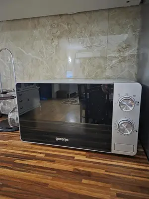 a toaster oven sitting on top of a counter at KOTOR OLD TOWN 2 bedroom apartment in Kotor