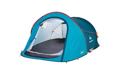 an open blue tent with the inside set up at Auto camp Matica in Podgorica