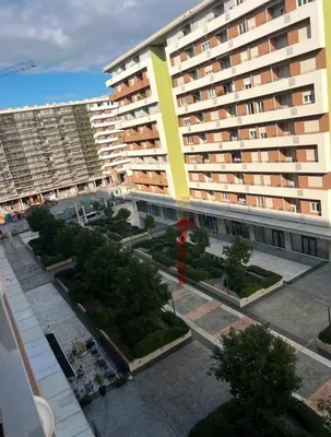 an aerial view of a large apartment building at White Homes - Central Point in Podgorica