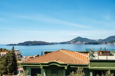 a view of the lake from a house at Przno Apartments by In Property in Pržno