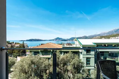 a view of the water from a balcony of a building at Przno Apartments by In Property in Pržno