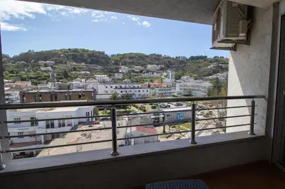 a balcony with a view of a city at APARTMENTS ANI in Ulcinj