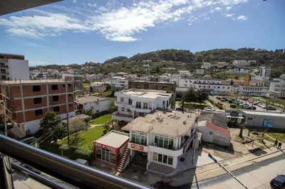 an aerial view of a city with a building at APARTMENTS ANI in Ulcinj