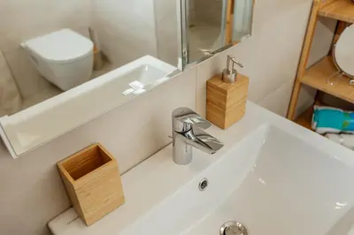 a bathroom with a sink and a mirror at Apartment Throne in Kotor