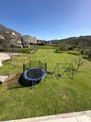 a trampoline in the grass in a field at SARA in Ðuranovići