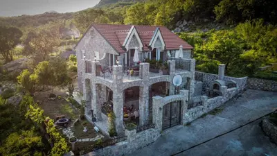 an overhead view of a house with a balcony at Villagio in Virpazar