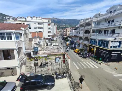 a view of a city street with cars and buildings at Glory Suites in Budva
