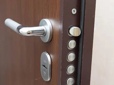 a close up of a wooden door with a handle at Apartment Kosta in Podgorica