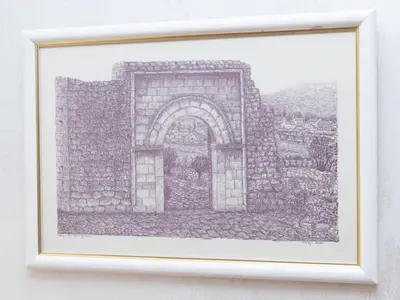 a drawing of a gate in a stone wall at Apartment Kosta in Podgorica
