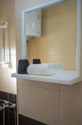 a white towel on a counter in a bathroom at Villa Elezi in Ulcinj