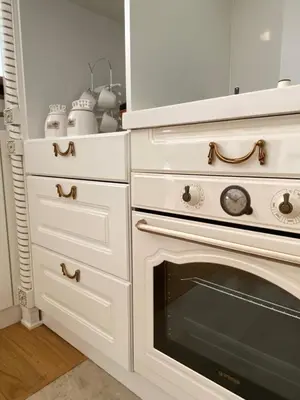 a kitchen with a white stove and some drawers at Lux Apartment Meecoon Rafailovići in Rafailovici