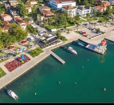 an aerial view of a harbor with boats in the water at Bay Mola Home in Kotor