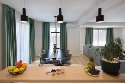 a living room with a table with fruits on it at Villa Fotinia in Budva