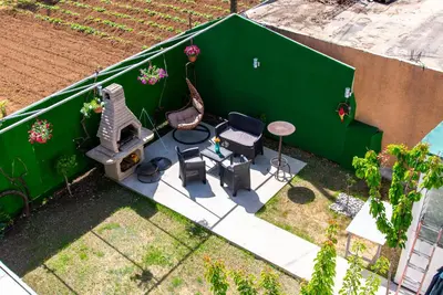 an overhead view of a patio with chairs and a table at Vila apartment Astorija 2 in Podgorica