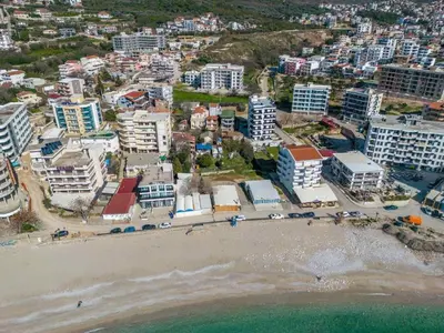 an aerial view of a beach and buildings at Apartments 4U in Dobra Voda