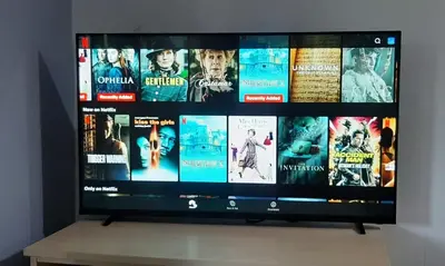 a flat screen tv sitting on top of a table at Design studio in Petrovac in Petrovac na Moru