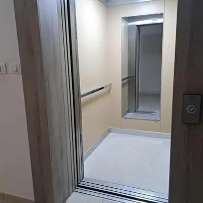 an empty room with a door and a mirror at Marina City key Luxury Studio in Podgorica