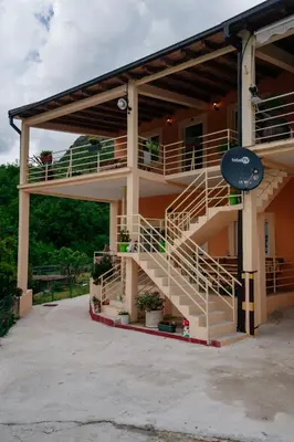 a building with stairs on the side of it at Omni S Apartments in Bar