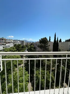 a view of a city from a balcony at Alex Apartments in Podgorica