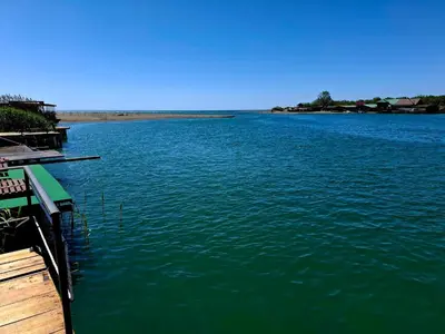a view of a large body of water at Ada Bojana kucica Una in Ulcinj