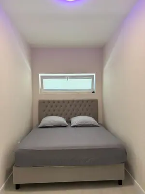 a bedroom with a bed and a window at Montesea Villa in Gornji Sušanj