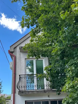 a building with a balcony on top of it at Studio Nik in Cetinje