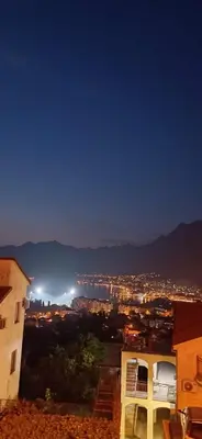 a view of a city at night with lights at Vaso & Viktor Apartment in Kotor
