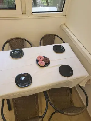 a table with donuts sitting on top of it at Apartman Vučko in Rafailovici