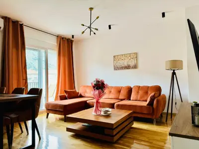 a living room with a couch and a table at Nonna Marija in Kotor