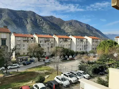 a view of a city with mountains in the background at Nonna Marija in Kotor