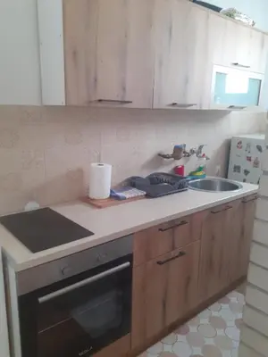 a kitchen with a sink and a counter top at Lamela in Bar