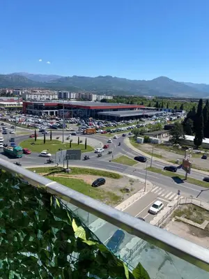 a view of a city with a parking lot at Apartman Podgorica in Podgorica