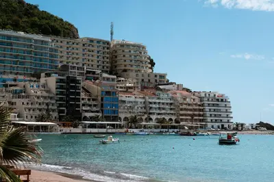a large body of water in front of a city at Historic Seafront Family Villa in Rafailovici