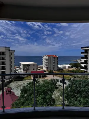 a view of the ocean from a balcony at Sarah in Bijela Glavica
