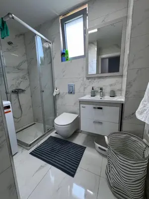 a bathroom with a shower and a toilet and a sink at Sarah in Bijela Glavica