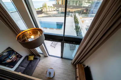 an overhead view of a room with a large window at Invictus Hotel in Budva