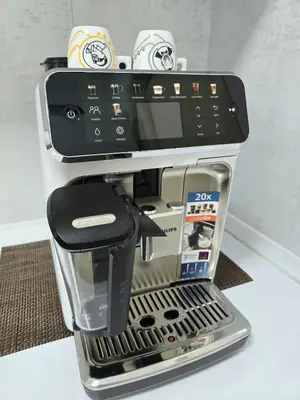 a coffee machine is sitting on a table at D&D Apartman in Bar